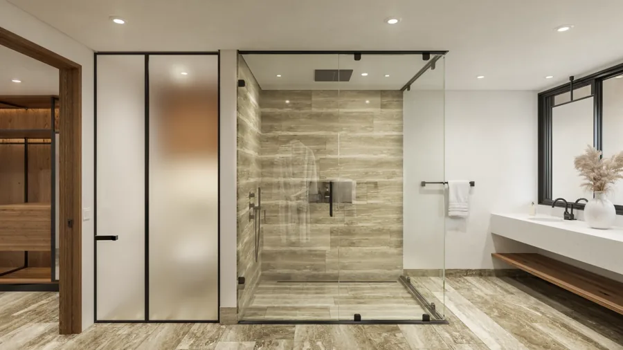 Proposed primary bathroom with stone-look surfaces, glass shower enclosure, and wood cabinetry