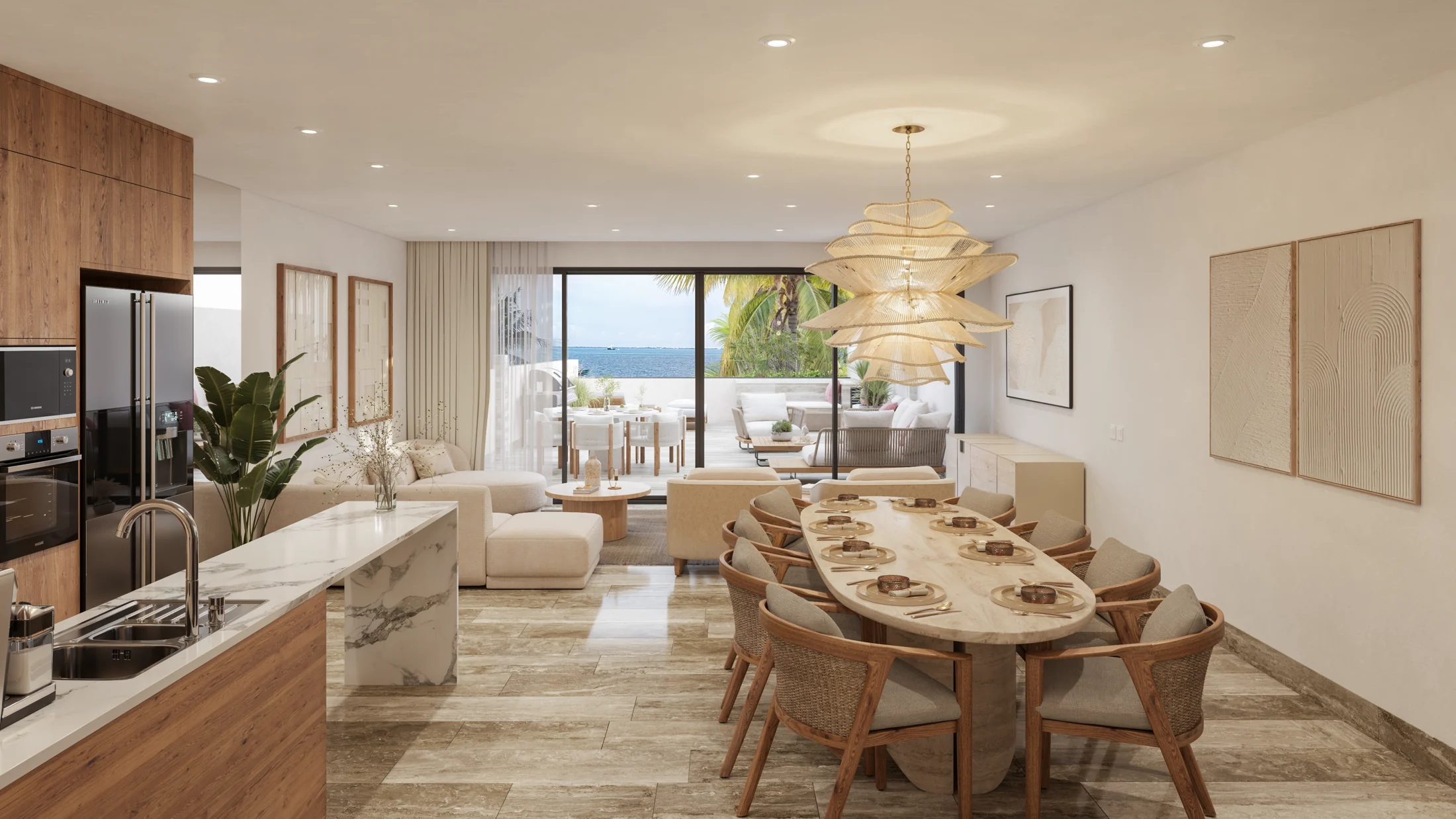 Open kitchen, dining, and living spaces connected to a terrace overlooking the sea